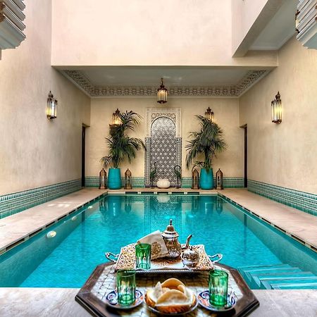 Riad Kniza Marrakesh Swimming Pool photo The swimming pool at the hotel