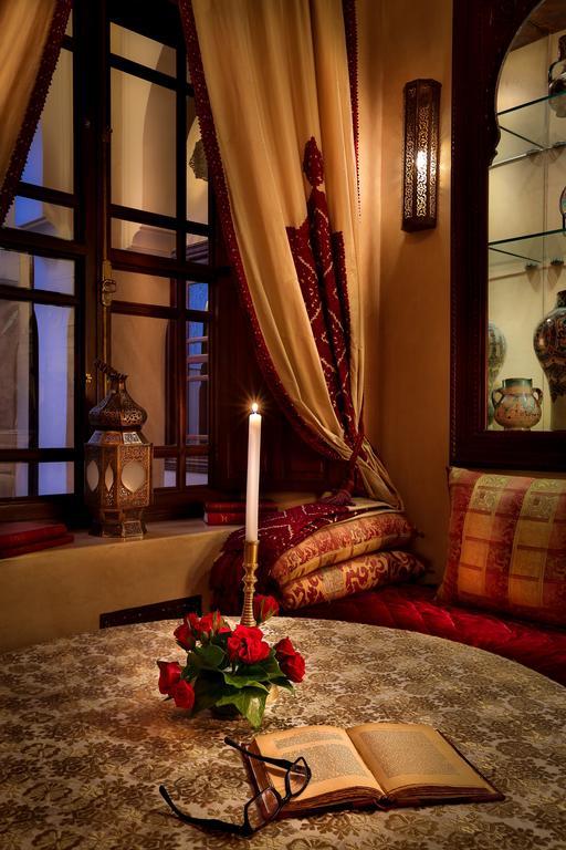 Riad Kniza Marrakesh Exterior photo A candle in a Moroccan house