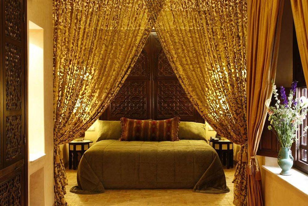 Riad Kniza Marrakesh Exterior photo A bedroom at the Taj Mahal Palace