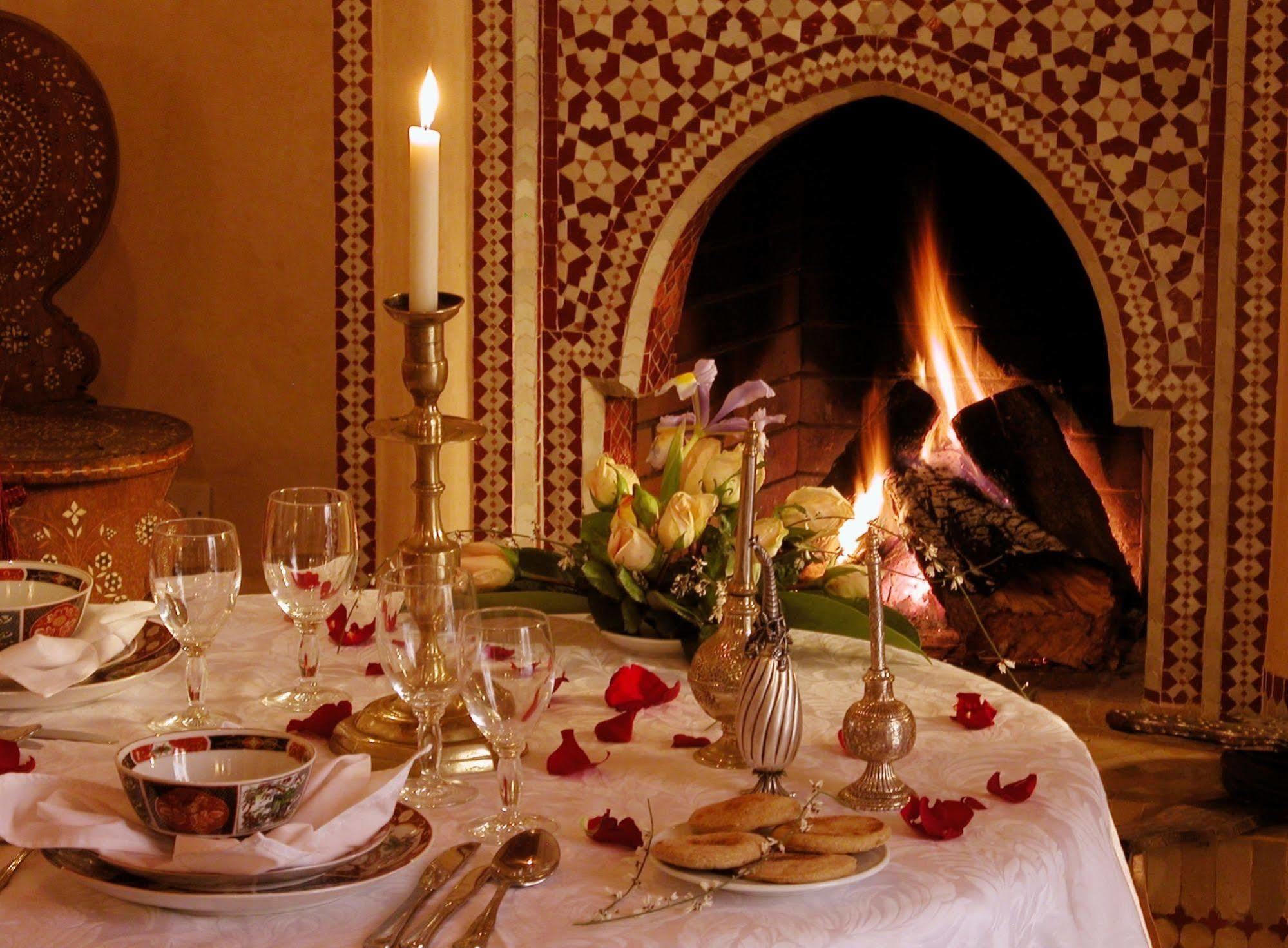 Riad Kniza Marrakesh Exterior photo A Moroccan fireplace